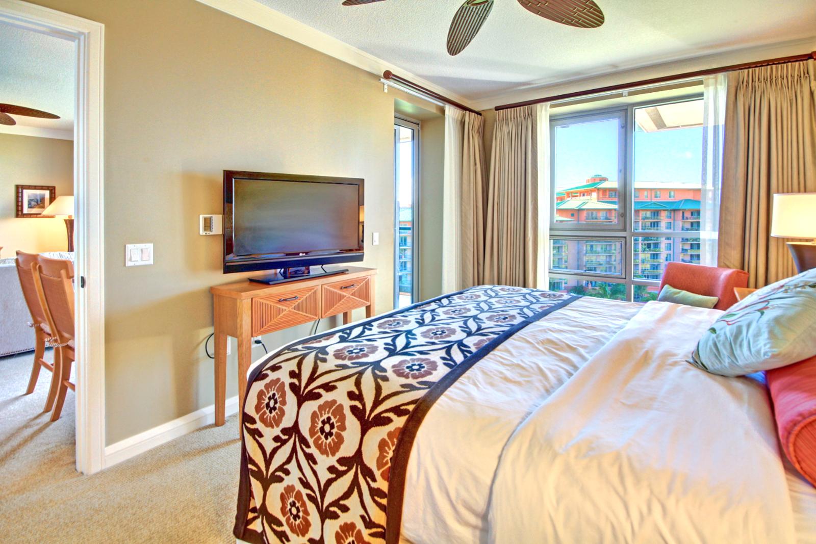 Master bedroom also has a large LG flat screen TV along with private access out to the lanai. 