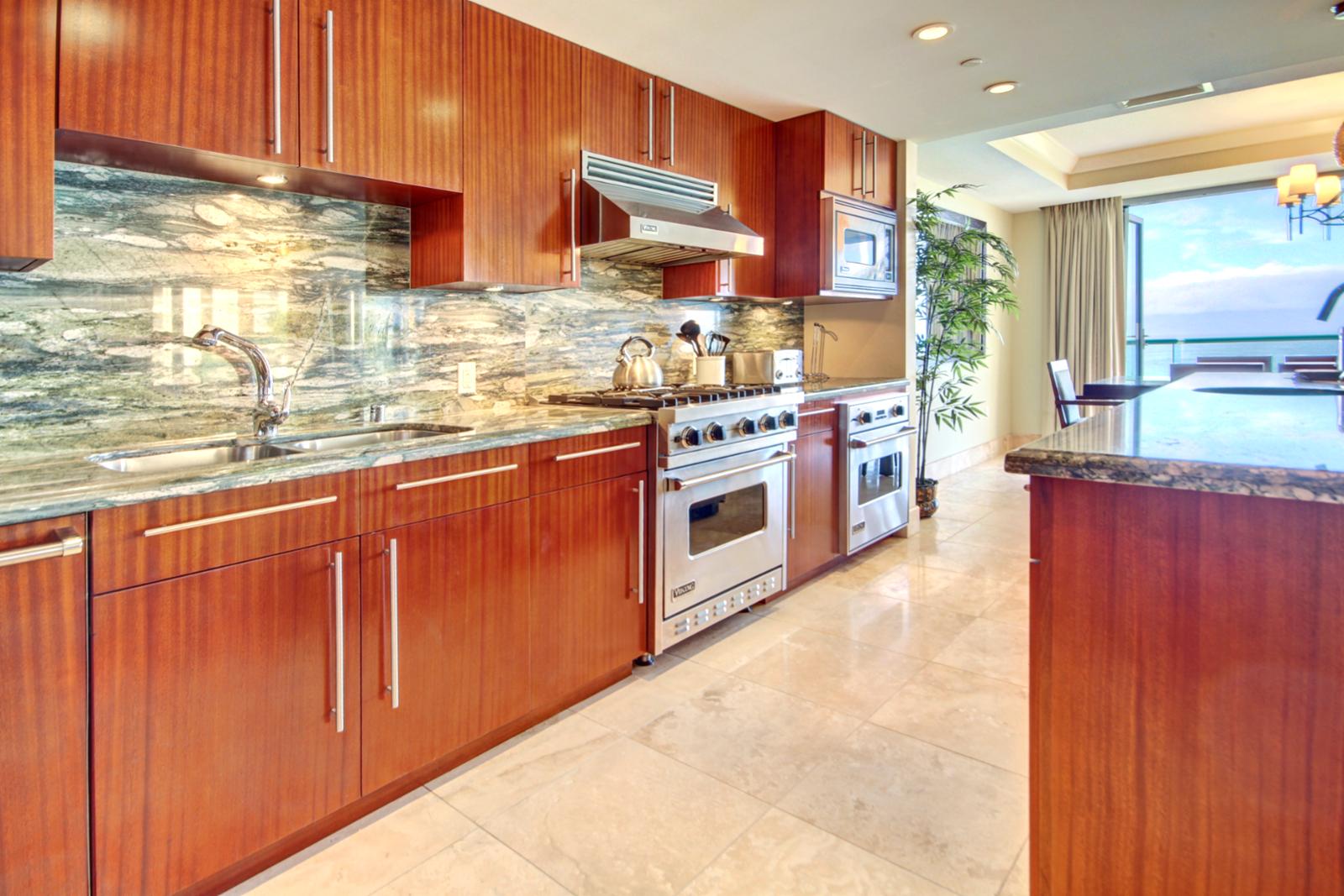 Large custom gourmet kitchen with all Viking appliances. 