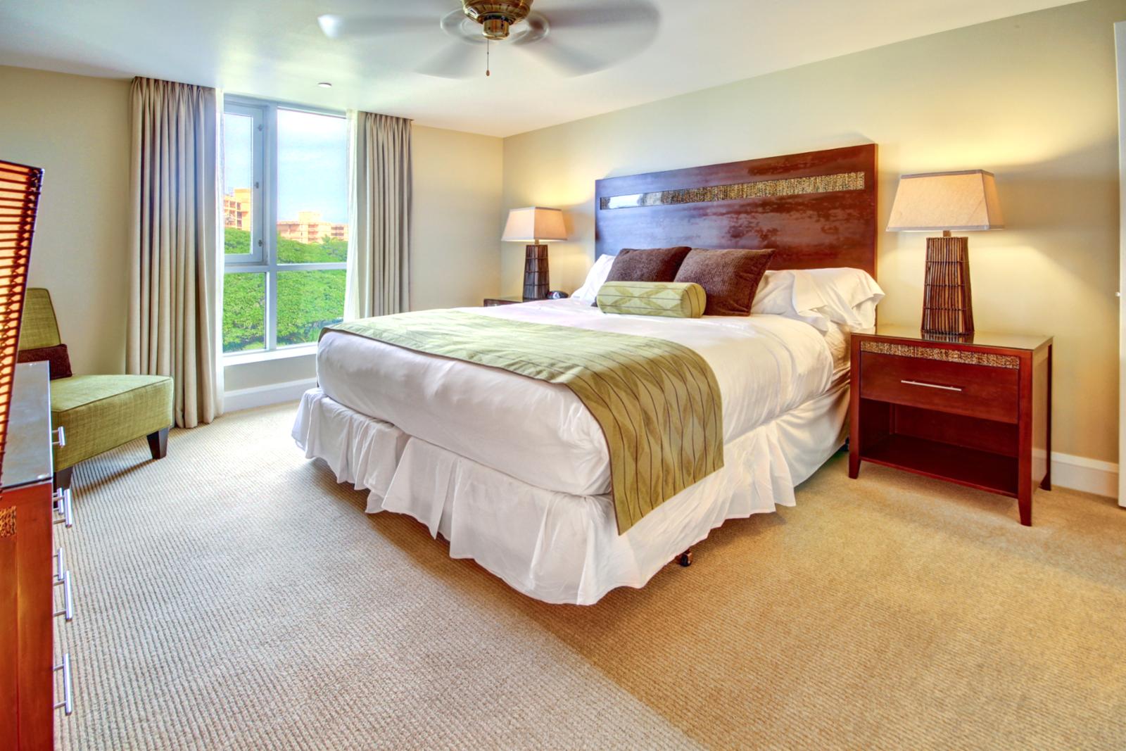 Large guest bedroom with walk in closet. 