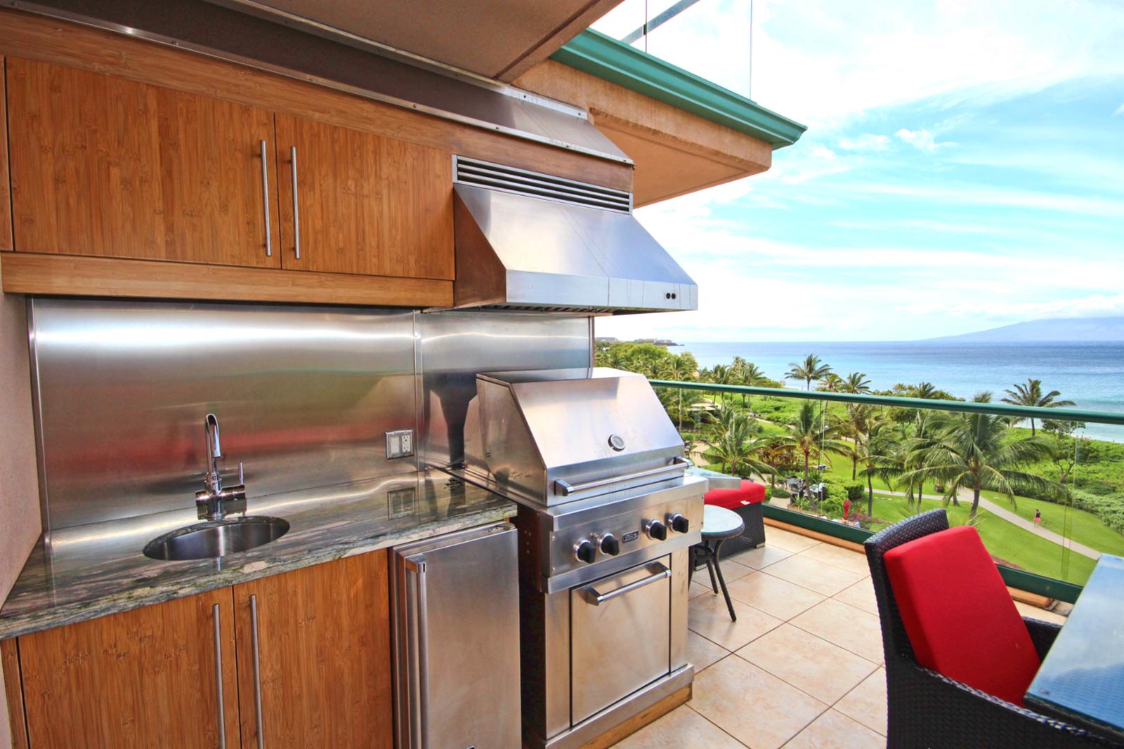 Outdoor kitchen with a view. Large Viking BBQ gas grill with fridge and sink on the lanai. Notice the open lanai to enjoy Maui sunshine. 