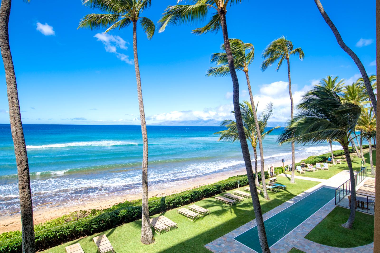 Enjoy your beachfront paradise just steps away from this unit