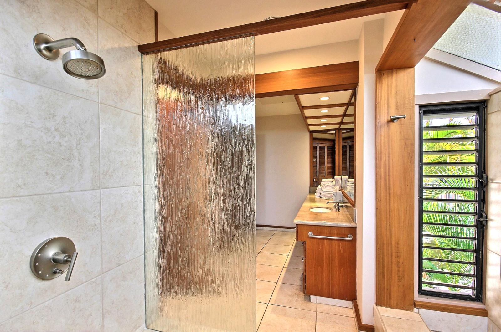 Large guest bathroom with sunken shower. 