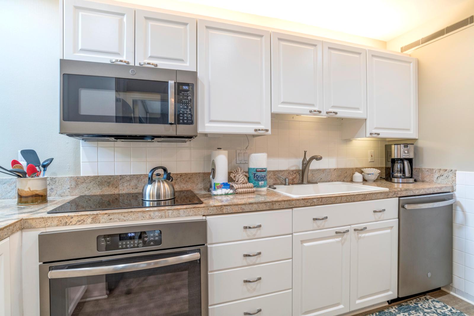 Updated stainless steel appliances and custom furnishings