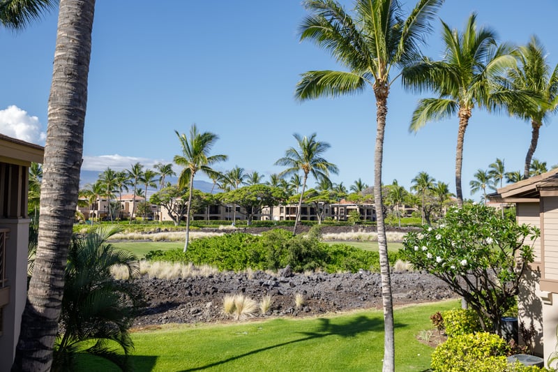Vibrant foliage and gentle water features enhance the serene outdoor ambiance. Waikoloa’s landscaping is an artful expression of island life.