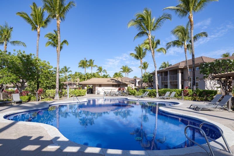 Dive into the sparkling pool surrounded by tropical gardens and peaceful water features. Colony Villas’ pool area is your personal island oasis.