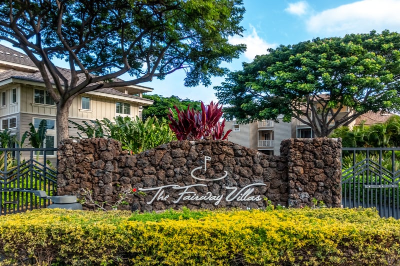 Welcome to Fairway Villas Waikoloa, where lush landscaping and island charm greet you just beyond the entry gate.