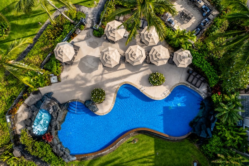 Your tropical oasis awaits. Soak up the Hawaiian sun on the expansive pool deck, complete with comfortable loungers and umbrellas.