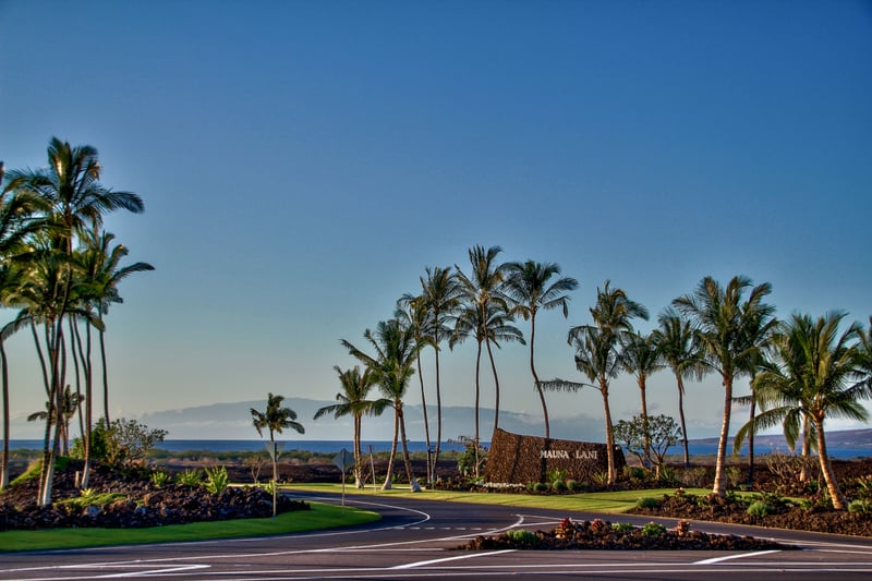 Arrive in paradise with sweeping ocean views, perfectly manicured grounds, and iconic Big Island palm-lined roads