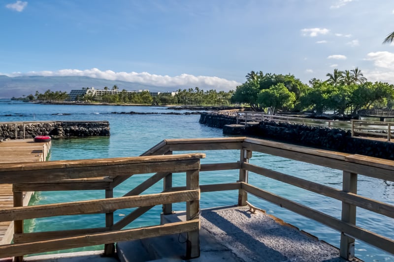 Private scenic deck invites peaceful moments with unobstructed ocean bay views and majestic island mountains