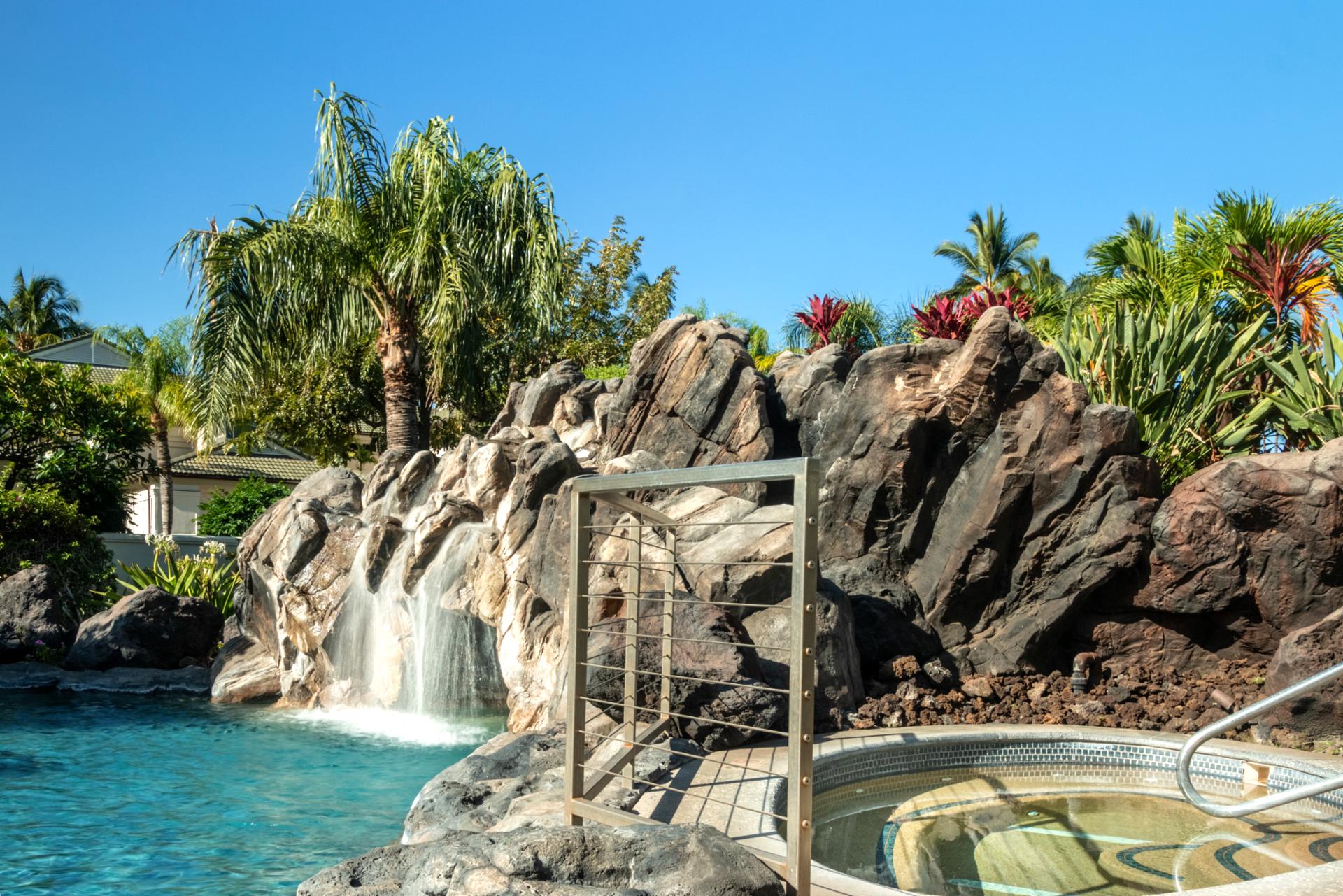 Relax in multiple resort-style pools with sparkling waterfalls, rock formations, and shaded cabanas