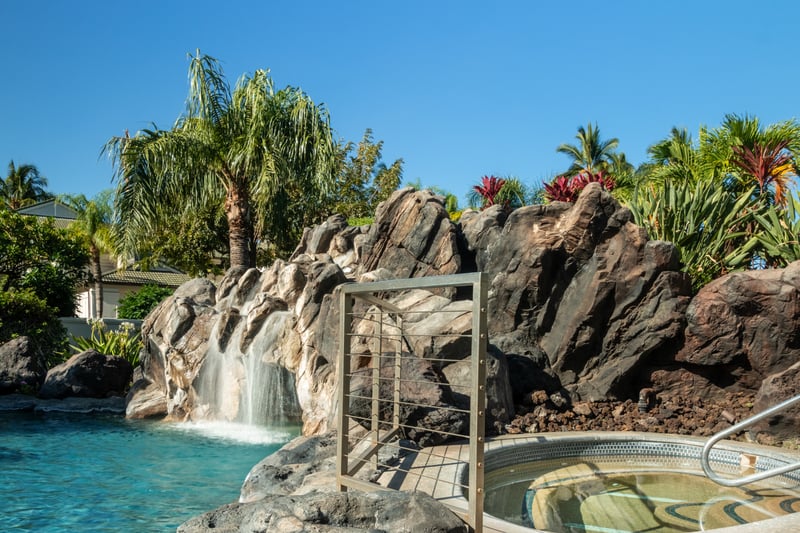 Relax in multiple resort-style pools with sparkling waterfalls, rock formations, and shaded cabanas