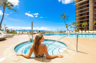 Indulge in the oceanfront hot tub and pool at Kaanapali Shores, where breathtaking Maui views meet luxury resort comfort daily