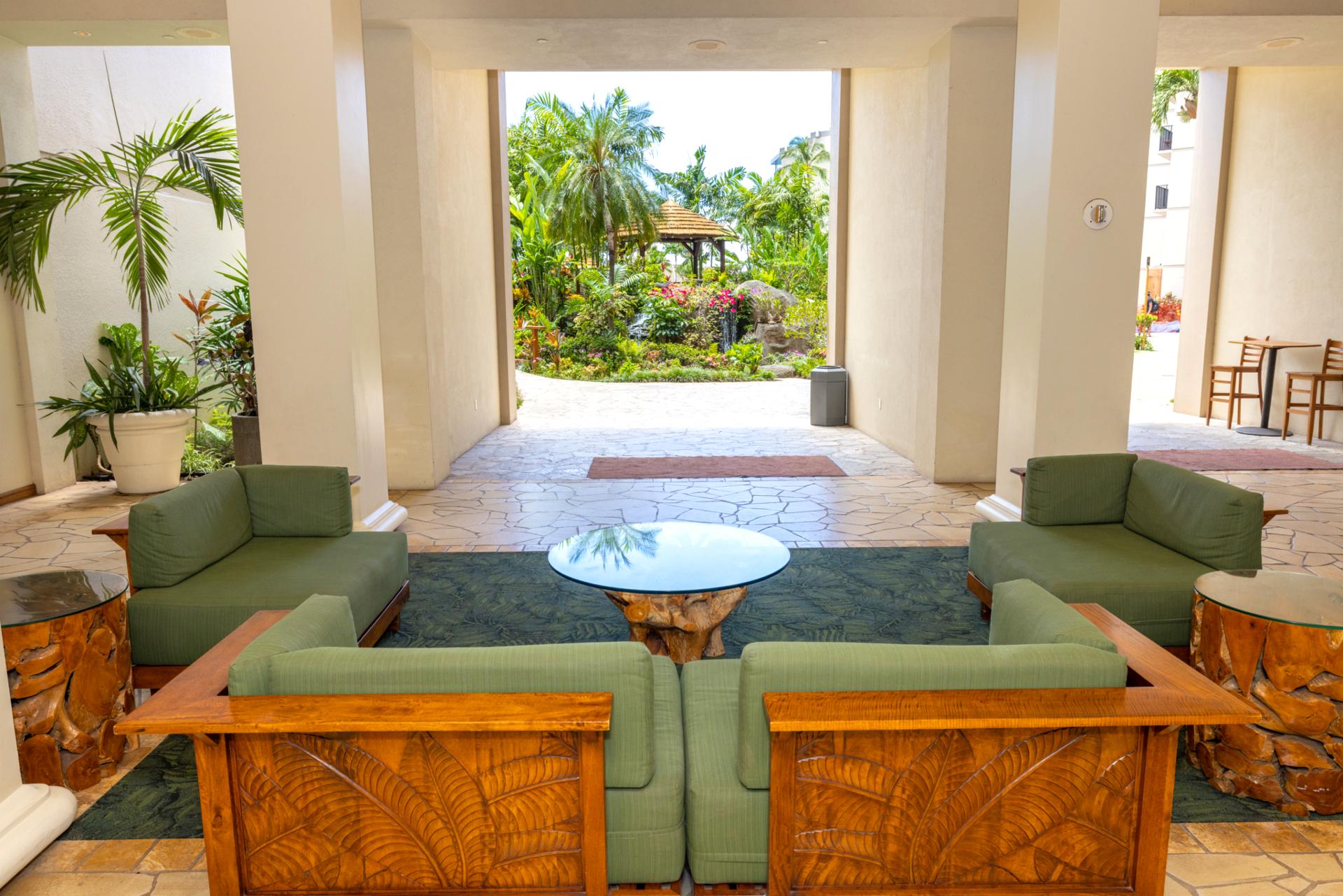 Enjoy the open-air lobby at Kaanapali Shores with garden views and tranquil seating, creating a welcoming Maui resort arrival