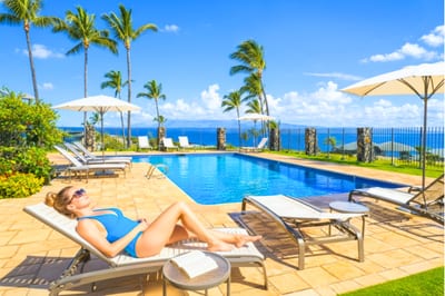 Lounge poolside on comfortable chairs while soaking up breathtaking island views. The peaceful ambiance invites you to unwind and recharge.