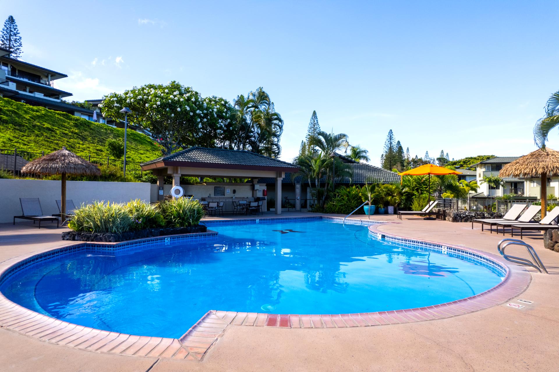 The pool area at Kapalua Golf Villas is designed for comfort and tranquility. Dive in or bask in the sun, either way, paradise is just steps away.