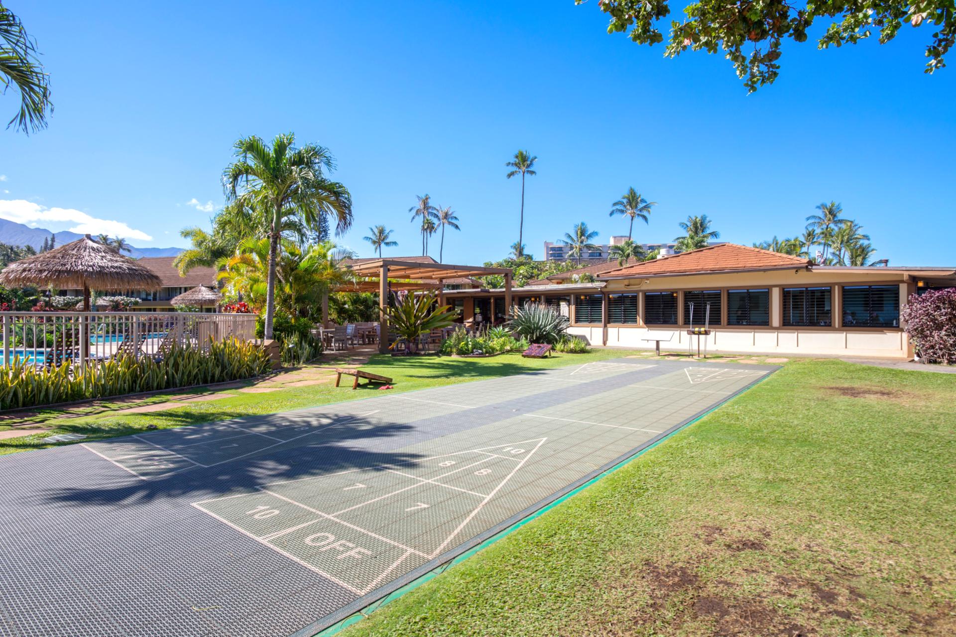 Enjoy indoor leisure with a private library, elegant reading lounge, ping pong table & tropical resort ambiance