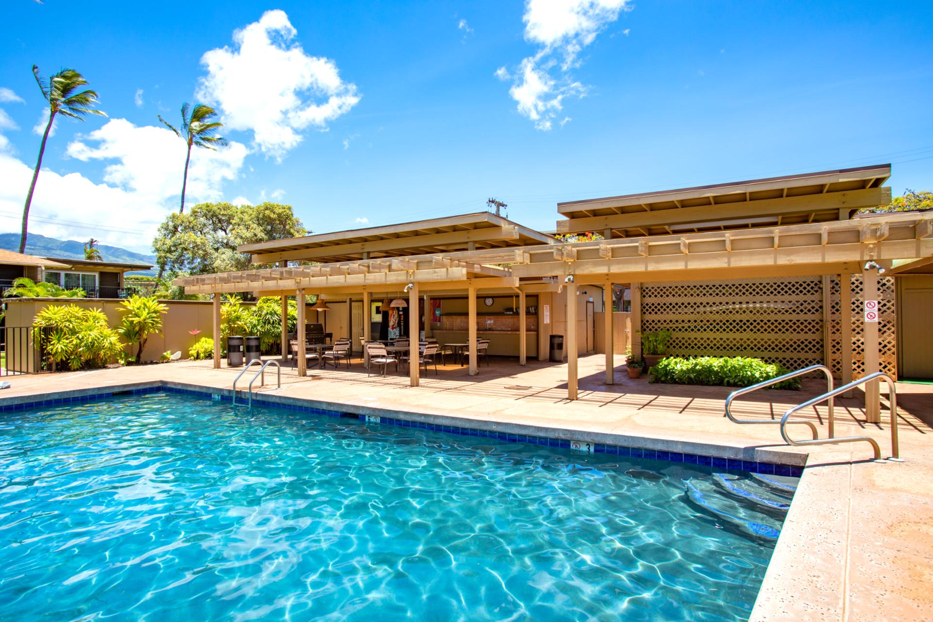 Lounge by the poolside with a tropical drink in hand at Maui Sands. The gentle sound of the ocean makes every moment feel like a dream come true.