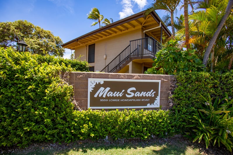 Welcome to Maui Sands, your tropical home away from home on Lower Honoapiilani Road. Surrounded by lush greenery and island breezes, this inviting entrance sets the tone for a relaxing Hawaiian getaway.