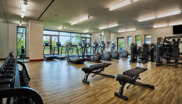 Stay active in our fully equipped fitness center, featuring ocean views, modern equipment & spacious design