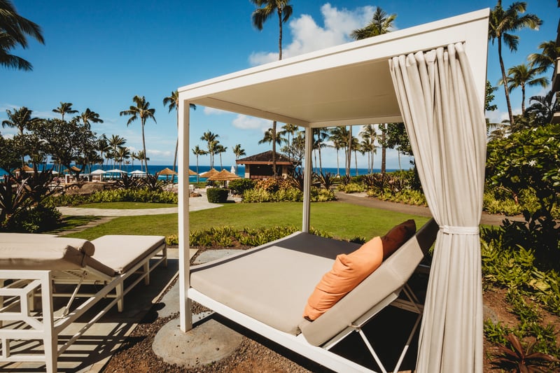 Escape to your private Maui cabana with ocean views, swaying palms, plush seating & exclusive island serenity
