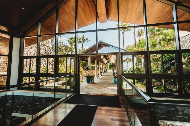 Enter paradise through grand glass doors opening to Maui’s breathtaking oceanfront and luxury open-air lobby
