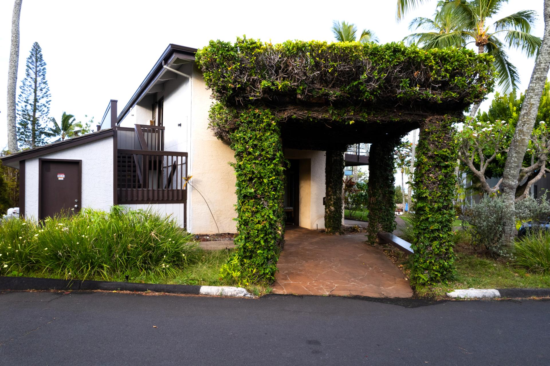 The lush entry of Napili Point Resort sets the tone for your Maui getaway, inviting you into a world of tropical elegance and island charm.