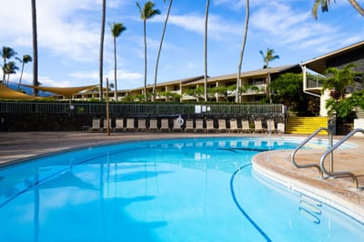 Swim, lounge & relax in crystal-clear pools surrounded by tropical gardens at Napili Shores Resort