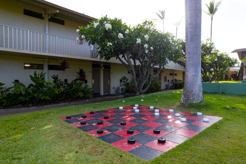 Island recreation includes shuffleboard, oversized checkers & lush surroundings at Napili Shores