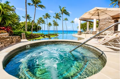 Soak in our oceanview hot tub surrounded by tropical palms, serene views & ultimate resort relaxation