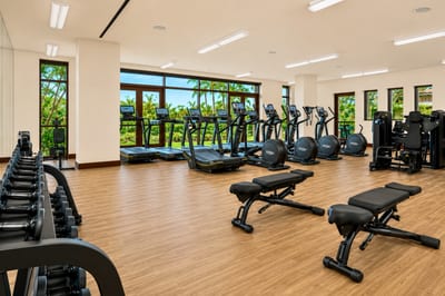Stay active in our fully equipped fitness center, featuring ocean views, modern equipment & spacious design