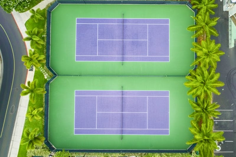 Oceanfront resort with championship tennis courts, beach access, ocean views, infinity pools, fitness center & tropical gardens