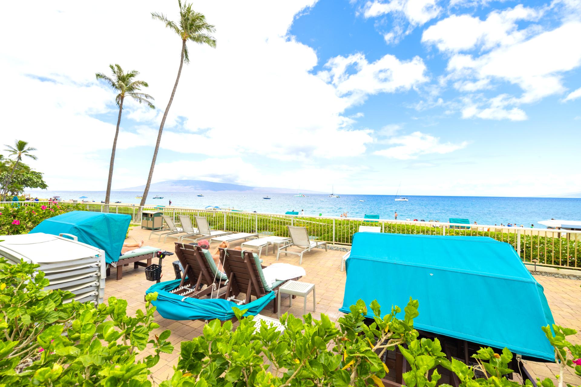 Private beach access with oceanfront loungers, luxury cabanas, panoramic ocean views, crystal waters & tropical resort gardens