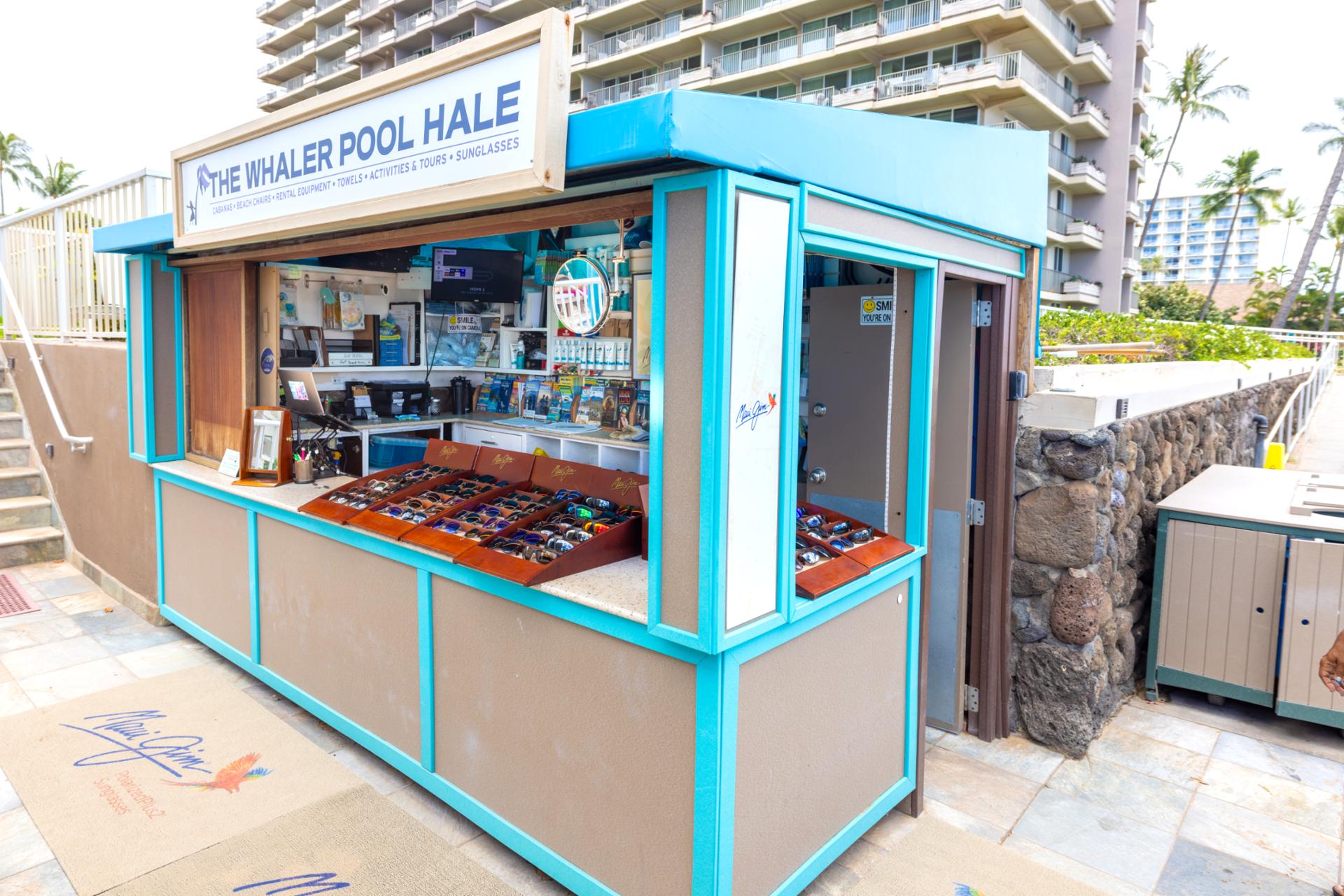 Poolside guest center with beach gear rentals, tour bookings, cabanas, beach chairs, towels, sunglasses & activities desk
