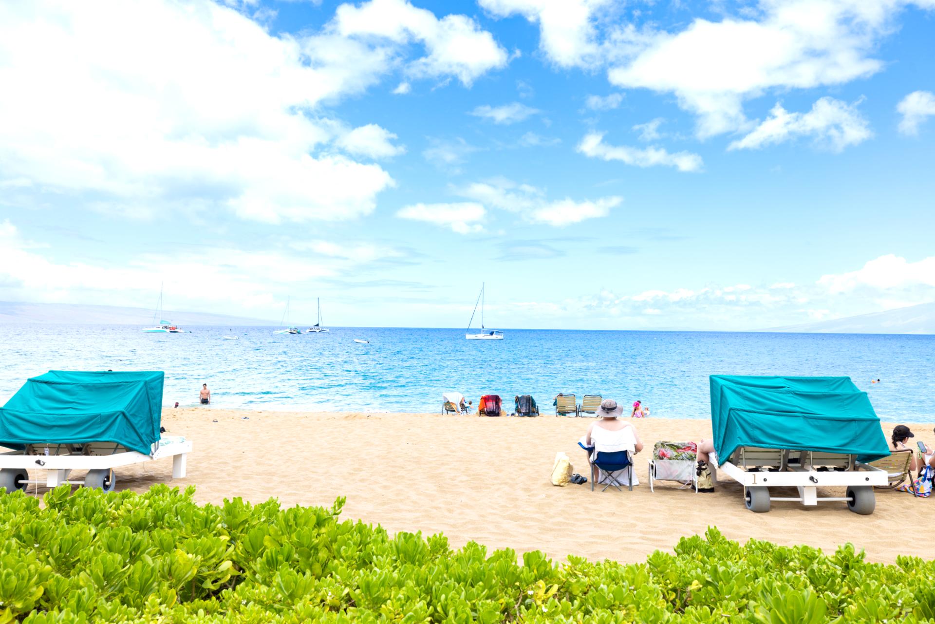 Relax under shaded cabanas on golden sand beaches, with calm turquoise waters, panoramic views, and peaceful oceanfront comfort