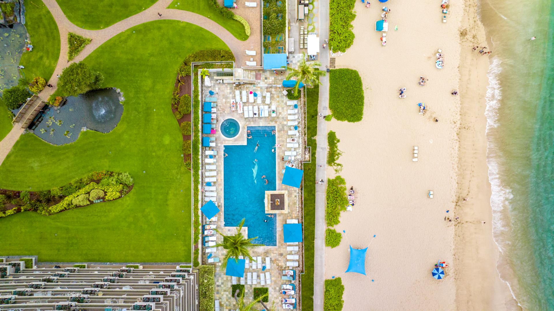 Oceanfront luxury with direct beach access, private lanais, resort pools, tennis courts, golf views & tropical gardens