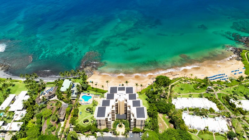 Elegant coastal hideaway: private beach, sparkling pool, tropical gardens & solar-powered resort comforts