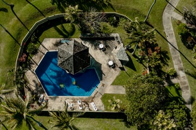 Tucked within Kuilima Estates, this octagon-shaped pool features a shaded pavilion, lounge chairs, BBQ grills, and playful turtle mosaics for laid-back days in the sun.