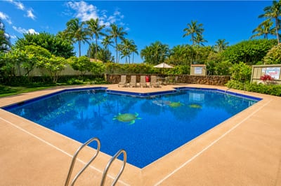 Luxury vacation getaway: relax poolside with ocean breeze, tennis, golf, lush gardens & tropical serenity