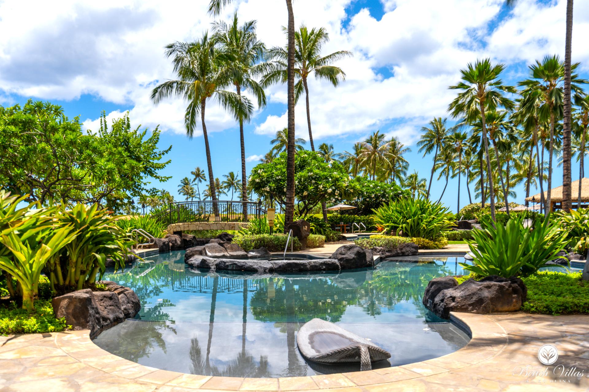 Swim beneath the bright Hawaiian sun and enjoy views of swaying palms. The pool here invites relaxation and endless fun.