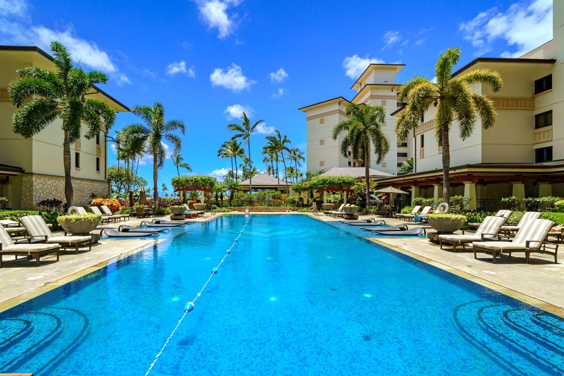 The inviting pool beckons for a leisurely swim or a quiet moment with a book. It’s the heart of relaxation at Beach Villas.

