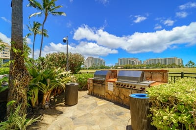 The BBQ area offers the perfect spot to gather with friends and family under the stars. Cook, laugh, and savor island-inspired meals together.