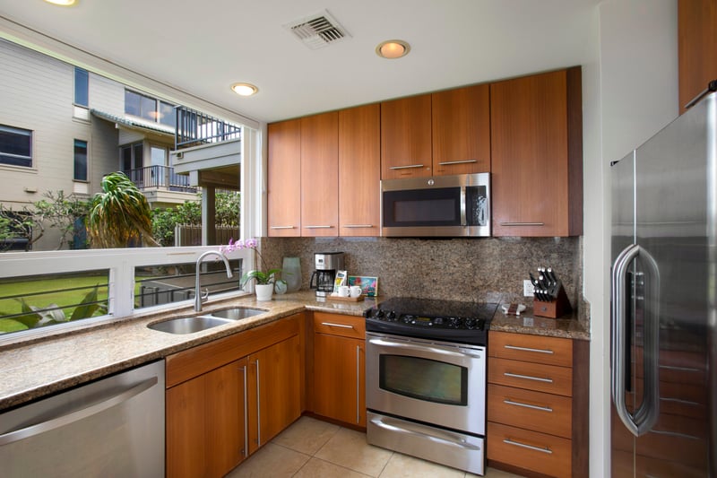 This sunlit kitchen is perfect for flipping pancakes, pouring bubbly, or just admiring the view while your toast pops