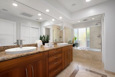 Where granite meets glam—this master bath blends modern elegance with just the right dose of tropical relaxatio KBV-31G4