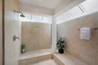 Step into your own personal spa—complete with marble tones, natural light, and the tub of your dreams. Robes optional!