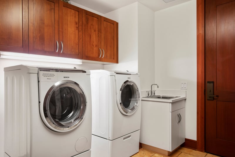 Enjoy the comforts of home with full laundry amenities, including Bosch machines and a utility sink for easy care MON-2204
