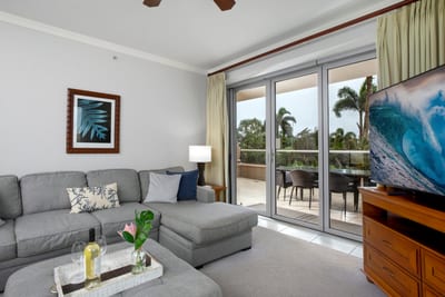 Tropical retreat living room with coastal décor and lush views. HKK-220