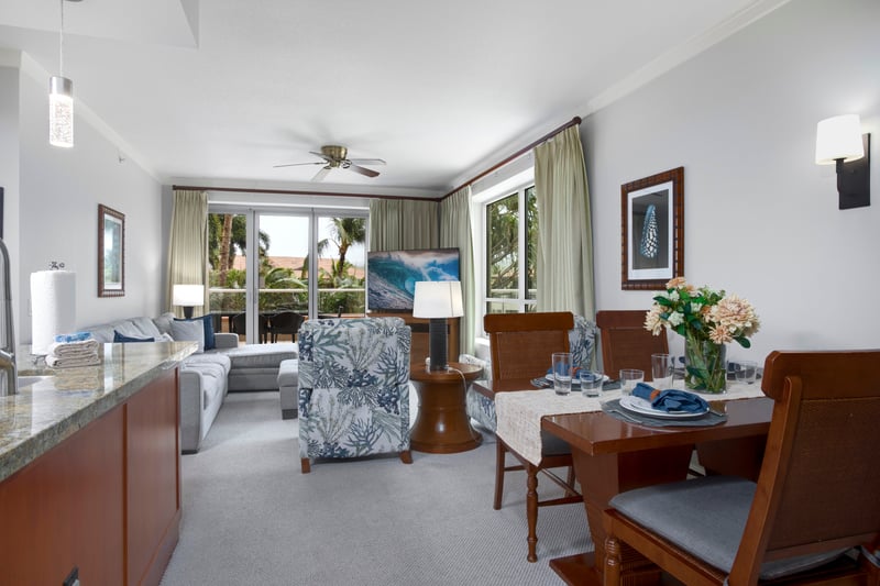 Elegant open-concept living with tropical flair and coastal dining charm. HKK-220