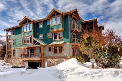 This alpine-style condo building features bold architectural lines, warm wood trim, and a central location for year-round adventures. TPC-102C