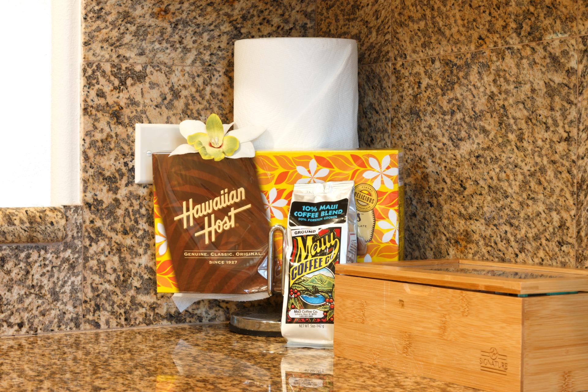 Granite counters and tropical touches create a warm, functional space for island-style cooking.