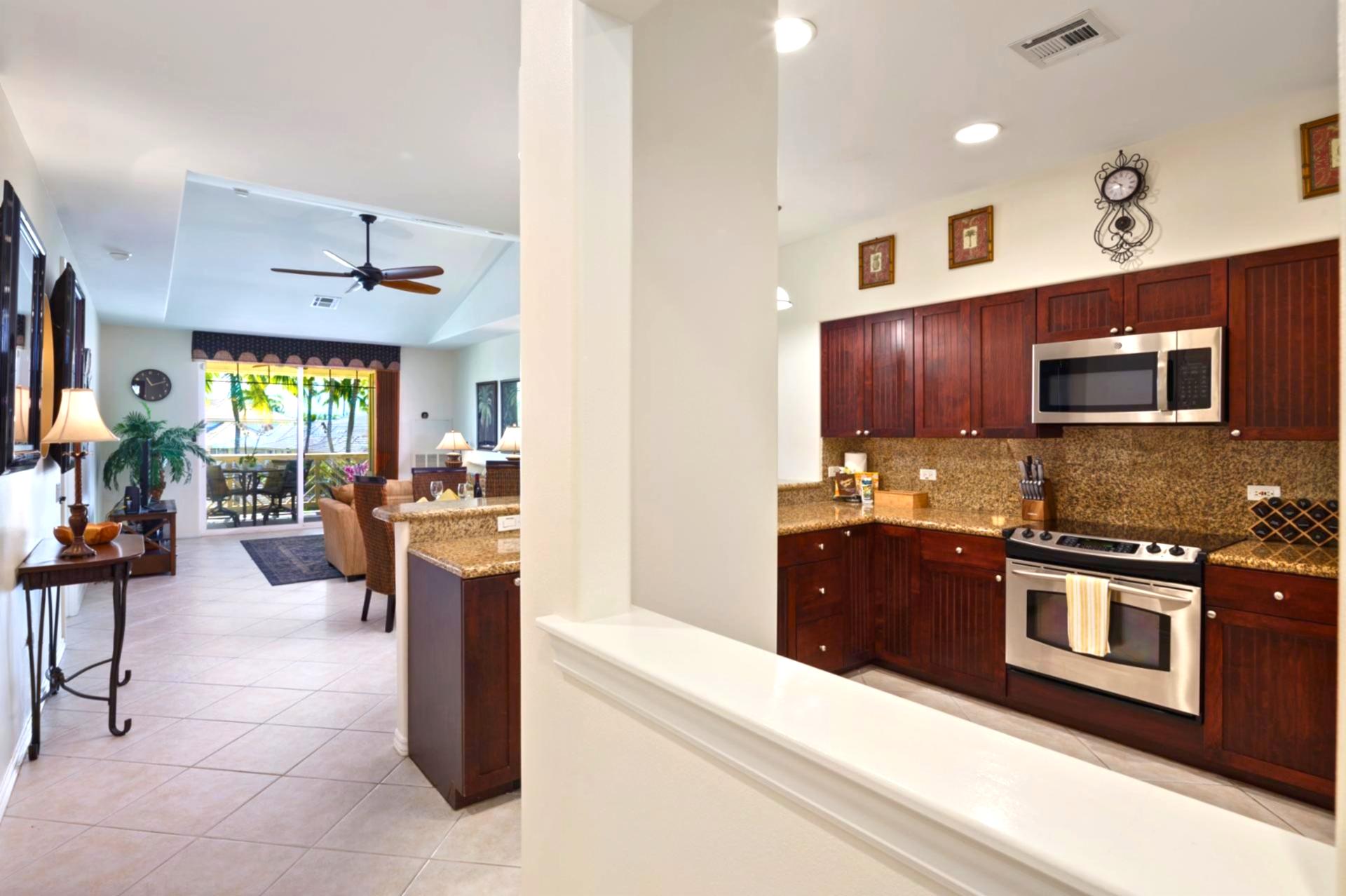 Full kitchen with modern appliances and ample cabinetry for easy in-unit meals.